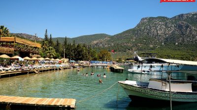 Akbük Koyu, Muğla ilinin Menteşe ilçesine bağlı Sarnıç Köyü sınırları