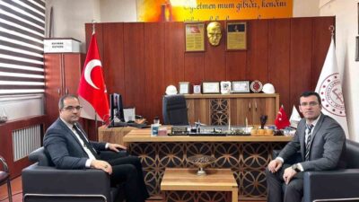 Manisa Sarıgöl Kaymakamı Halil Dalak, İlçe Milli Eğitim Müdürü Cezmi