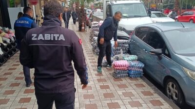Turgutlu'da Zabıta Müdürlüğü ve Emniyet Müdürlüğü ekipleri yağışlı havaya rağmen