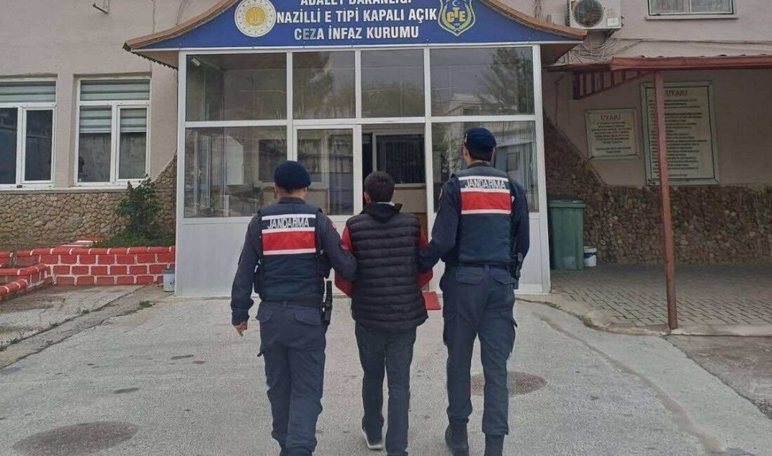 Nazilli ilçesinde dolandırıcılık suçundan aranan ve 5 yıl hapis cezasıyla