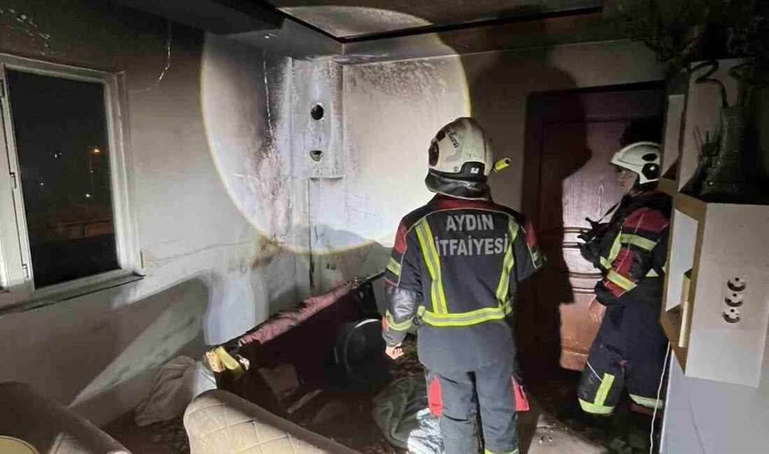 Efeler ilçesinde bulunan bir evde çıkan yangında bir çocuk ve