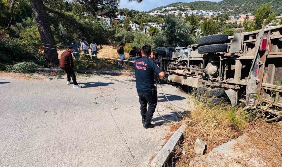 Bodrum ilçesinde meydana gelen bir kaza sonucunda iş makinesi taşıyan