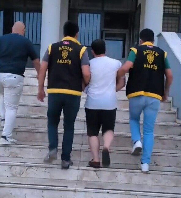 Kuşadası ilçesinde uyuşturucu ticareti suçundan aranan bir şahıs, gizlendiği yerde