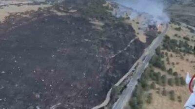 Balıkesir’in Karesi ilçesindeki bir arazide yangın çıktı. Yangına, rüzgarın da