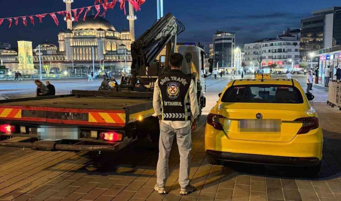 Beyoğlu’nda turist bir yolcuyla seyahat eden bir taksi şoförü, taksimetreyi