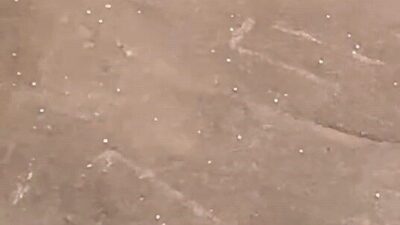 İnegöl ilçesinde beklenmedik bir şekilde başlayan dolu ve sağanak yağış,