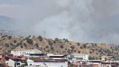 Nazilli ilçesindeki tarım arazisinde çıkan yangınla ilgili söndürme çalışmaları hala