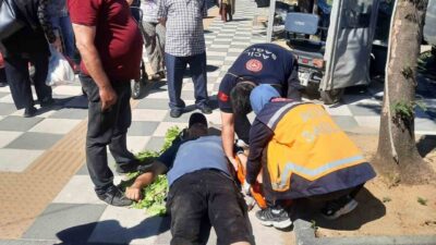 Muratlı ilçesindeki semt pazarı girişinde bir vatandaşın, kaldırımda ayağının takılması