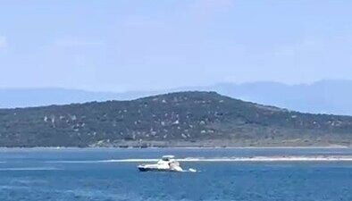 Ayvalık ilçesine bağlı Balıkesir’de denizde kaybolan bir genç için arama