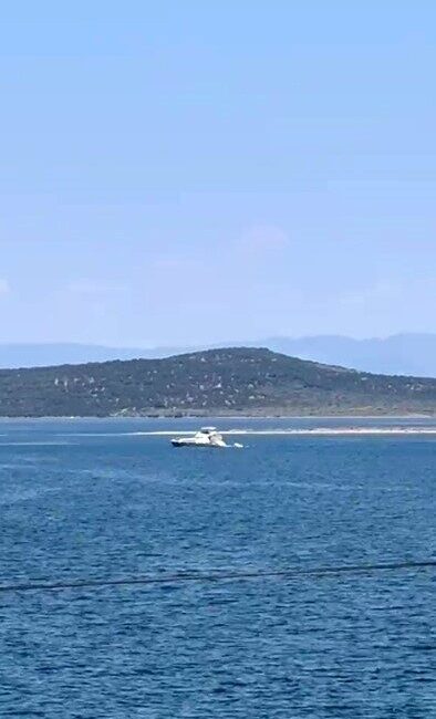 Ayvalık ilçesine bağlı Balıkesir’de denizde kaybolan bir genç için arama