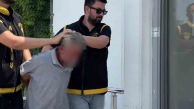 Adana’daki bir kuyumcu dükkanına taş atarak camını kıran ve içeriye