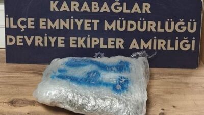 İzmir Karabağlar ilçesinde, uyuşturucu sakladığı arazide yakalanan bir şüpheli, polis