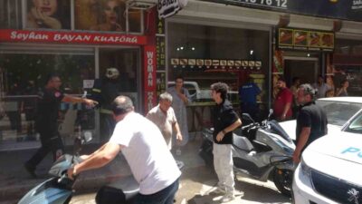 Antalya’da bir bayan kuaförü işleten bir baba, oğlunun balkonuna gölgelik