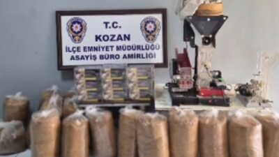 Kozan ilçesinde polis ekipleri tarafından gerçekleştirilen operasyonda kaçak tütün mamullerinin