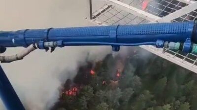 Aydın’ın Kuyucak ilçesinde devam eden orman yangınına karadan ve havadan