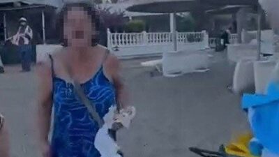 Seferihisar ilçesindeki bir plajda şezlong konusunda yaşanan anlaşmazlık sonucu başörtülü