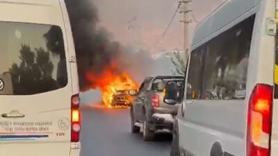 Milas ilçesinde seyir halindeki bir araçta çıkan yangın, itfaiye ekiplerince
