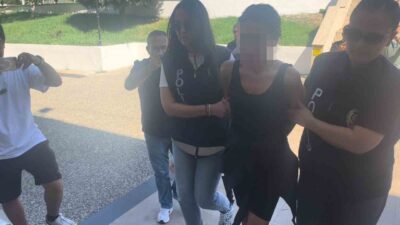 Muğla’nın Menteşe ilçesinde bir iş yerinin önünde bulunan Türk bayrağını