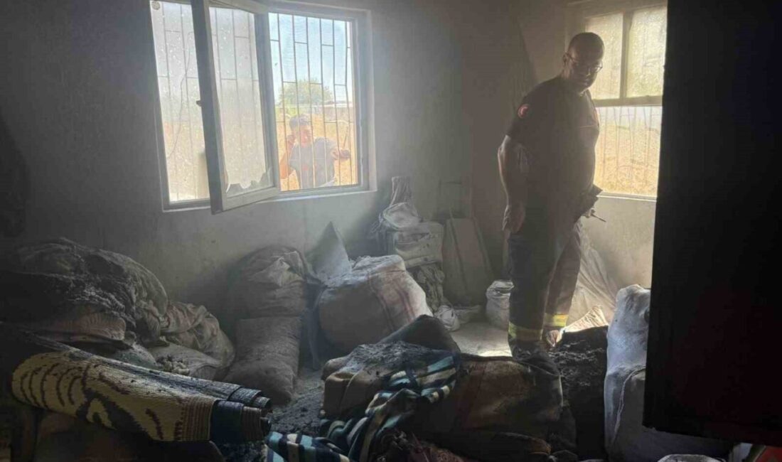 Serik ilçesinde bir gecekondu yangınında dumandan etkilenen yabancı uyruklu bir