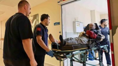 Bursa’nın İnegöl ilçesinde, ormanlık alanda çalışan bir işçi tomruğa zincir