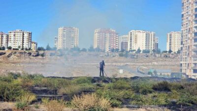 Kocasinan ilçesinde bir kadın, Beyazşehir Mahallesi’nde çıkan arazi yangınını salça