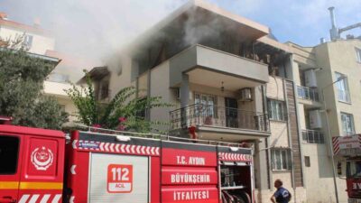 Efeler ilçesindeki bir apartmanın terasında çıkan yangın, itfaiye ekiplerinin müdahalesiyle